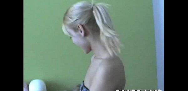  Funny teen tries different wigs while stripping for the cam
